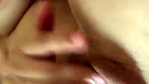 Mira's fingers glide over her creamy wet vagina