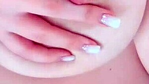 cute student teases with big bouncing breasts on bed