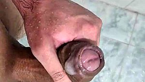 Young bisexual guy masturbates in the shower in this homemade video.