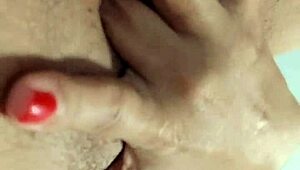 this latina babe with huge natural tits gets fingered and squirts everywhere