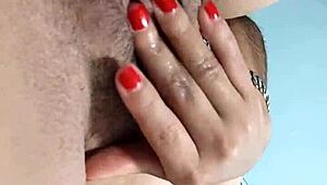 this latina babe with huge natural tits gets fingered and squirts everywhere