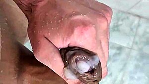 Young bisexual guy masturbates in the shower in this homemade video.