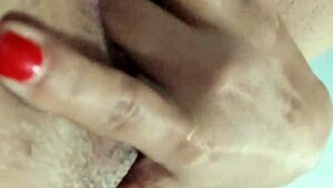 this latina babe with huge natural tits gets fingered and squirts everywhere