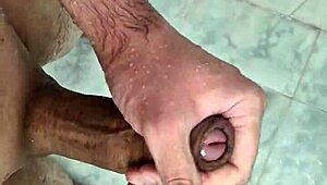 Young bisexual guy masturbates in the shower in this homemade video.