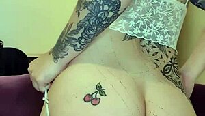 Red-haired beauty enjoys anal pleasure with toys and fingers