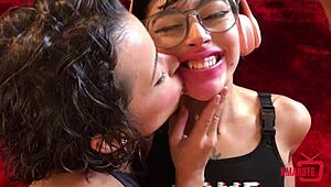 milf passionately kissing her young roommate in a hot lesbian moment