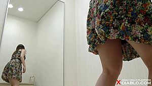 Detailed view of Japanese teen Miria Masuda's F-cup tits during changing