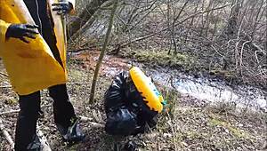 bizarre german femdom with mud and latex outdoors