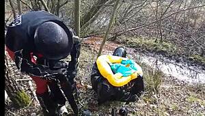 bizarre german femdom with mud and latex outdoors