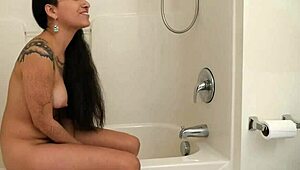 Tattooed Brunette Jade Rubbing Her Twat in Ecstasy