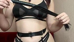 Beautiful BDSM girl wants to flog you with a whip and humiliate you.