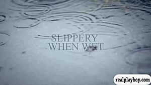 two attractive babes fucking a blue dildo while licking each other passionately