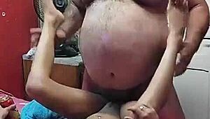 Young woman teases older man in garage daily