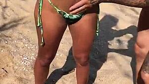 Beach Lesbians Apply Sunscreen in Tiny Bikinis