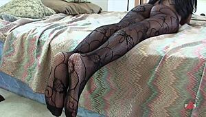 Ebony Model in Pantyhose Poses for Photo Session