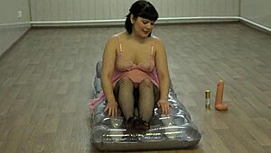 Milf anal fucks big dildo on mattress