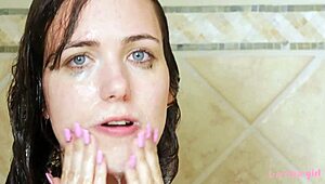 This captivating brunette savors every moment in a steamy sensual shower.