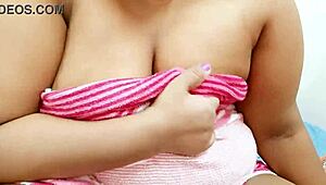 Myanmar aunty teasingly reveals her big tits to the camera