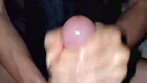 Skinny beauty gives a sexy handjob to her man and herself.