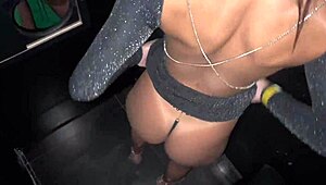 A sexy bar swinger gets some action at the glory hole and invites others into the cabin.