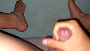 Young bisexual boy’s foot fetish masturbations with cum