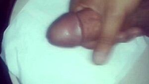 Check out this shaved cock in the bathroom