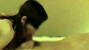 a stunning asian in chinese dress gives epic handjob