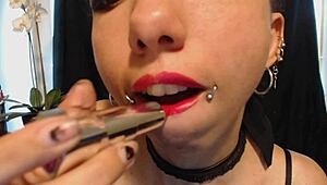 applying hot pink lipstick with drooling effect