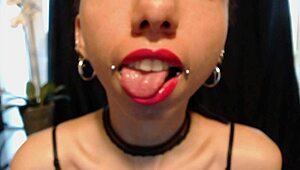 applying hot pink lipstick with drooling effect