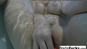 Sexy blonde pornstar nadia masturbates in bath with rubber duckies