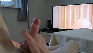 Watching gay porn and finishing with a hot cumshot
