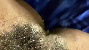 Oski fucks his hairy milf wife wet, she moans.