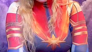 Captain Marvel bounces on a huge ebony dildo in cowgirl position 😈