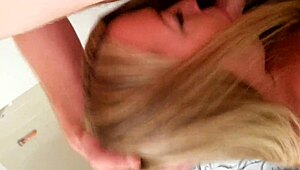 The Wife Gives A Deepthroat Blowjob To Her Husband's Big Cock At Home