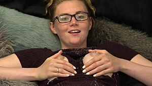 breastmilk fountain flows as young lady in glasses lets down during solo play.