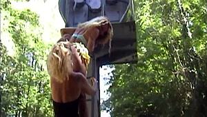 Two amateur lesbians fuck next to the road.