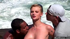 busty blonde tarra white in ocean threesome sucking big cock