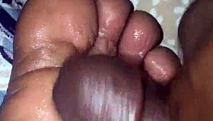 girlfriend gives foot treatment