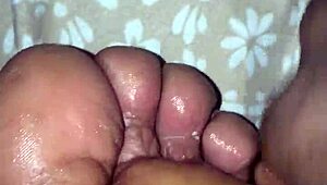 girlfriend gives foot treatment