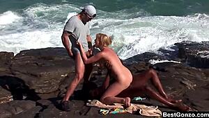 busty blonde tarra white in ocean threesome sucking big cock