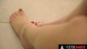 i love how gorgeous babe sybil in stockings gives footjob to her man till he cums on her pretty feets