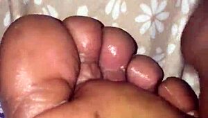 girlfriend gives foot treatment