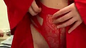 Brunette in red lingerie intensely masturbates her big tits and ass