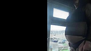 Public lactating beauty with a bisexual crossdresser by the window