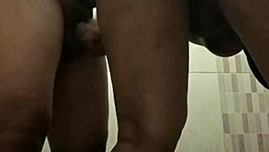 Mertua idaman shares intimate moment with menantu in private bathroom setting.