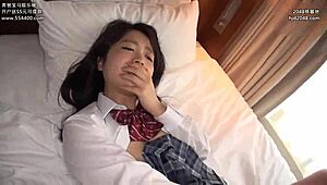 Young Asian woman drinks the saliva of a middle aged man