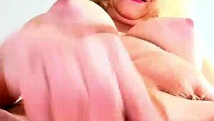 Mature lady gets naughty with big tits during work break! 😜