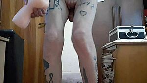 Gay Spanish guy in heels strokes his monster cock solo in part three