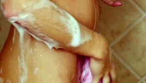 Young Blonde Enjoys Hot Shower