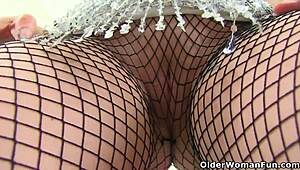 Older Woman Unveils Secrets in Fun Striptease Session